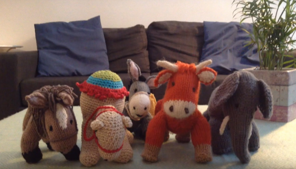 Animal knit toys in a living room